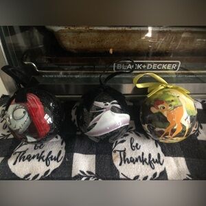 Disney’s the night before Christmas sally zero ornaments and also a Bambi one